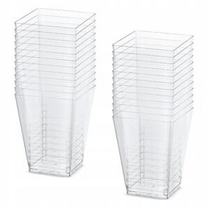Two tall stacks of clear square glass tumblers on a white background.